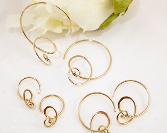Curly hoops 14k gold