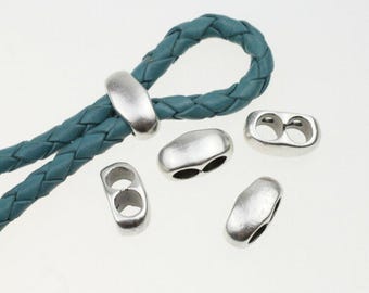 May include: A teal braided leather cord with several silver-colored metal clasps. The clasps are oval and have either one or two holes. The clasps are designed to connect the cord.