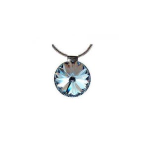 May include: A silver necklace featuring a round, blue crystal pendant. The pendant is intricately faceted, creating a sparkling effect. The chain is delicate, and the design is set against a white backdrop.