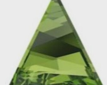 May include: A faceted, triangular gemstone in shades of green. The gem has a geometric design with multiple facets that reflect light. The overall shape is a perfect equilateral triangle, with a polished, smooth surface.