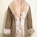 see more listings in the COATS AND FURS section