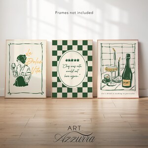 May include: Three framed art prints with a vintage aesthetic. The prints feature illustrations of a woman with a drink, a green and white checkered design with text, and a wine bottle with glasses. The text on the prints reads "La Dolce Vita", "Chef was cute, would eat here again", and "Let's drink to nothing in particular".