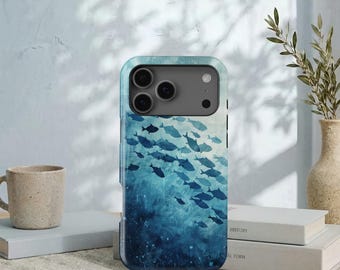 May include: A rectangular smartphone case featuring a deep blue underwater scene with a school of dark blue fish swimming in various directions. The case has a dark gray camera module cutout at the top with three circular lenses and a flash.