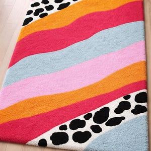 Colorful wavy pastel tufted rug with cow print corners rectangular shape