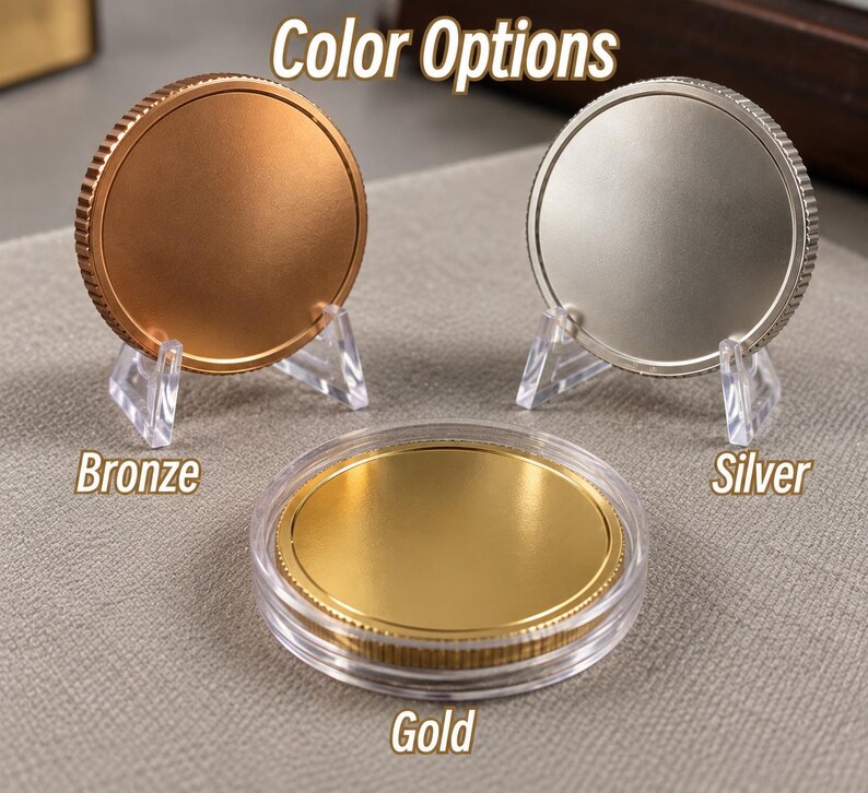 May include: Three circular metal coins labeled Color Options. One bronze coin and one silver coin are displayed upright on clear plastic stands. One gold coin is encased in a clear circular protective plastic capsule in the foreground.