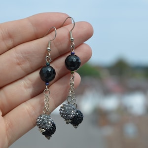 Rhinestone and disco ball black and silver dangle beaded earrings