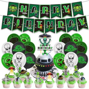 May include: A birthday party set with an alien theme. The set includes a banner reading "HAPPY BIRTHDAY", balloons, a cake, and cupcake toppers. The colour scheme is green, black, white, and silver. The decorations feature alien and UFO designs.