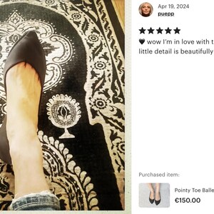 May include: Black pointy-toe ballet flats with a simple design. The shoes are on a black and white patterned rug. "wow I'm in love with this perfect shoes. Every little detail is beautifully crafted with love! Thx Ele" text is visible in the image. Purchased item: Pointy Toe Ballet Flats Shoes in Black Italian Lea... &euro;150.00