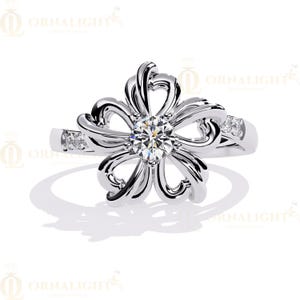 Elegant Floral Diamond Ring in White Gold – Center Round Diamond with Petal Design and Side Accents – Perfect for Engagement or Gift