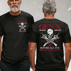 May include: A black short-sleeved t-shirt featuring a white skull graphic with crossed skeletal hands making rock-and-roll signs. The front displays 'GEN X EST. 1972' and the back features 'GEN X THE BADASS GENERATION 1965 1980 BEFORE ALL YOU SISSIES WERE BORN'.