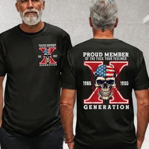 May include: A black t-shirt featuring a graphic of a skull wearing a stars and stripes bandana. The front displays the text PROUD MEMBER EST. 1972. The back features a large skull graphic with the text PROUD MEMBER OF THE FUCK YOUR FEELINGS GENERATION 1965 1980.