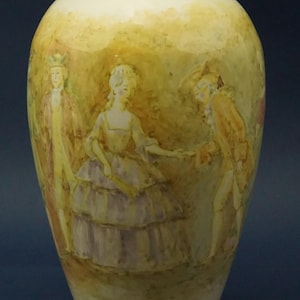 May include: Cream-colored ceramic vase with a painted scene of figures in period clothing. The figures are in shades of yellow, purple, and brown. The vase has a wide body and a narrow neck.