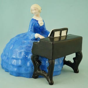 Deco ceramic sculpture of a lady playing the piano by Bertold Loffler for Wiener Keramik by M. Powolny, Austria, Viennese Secession