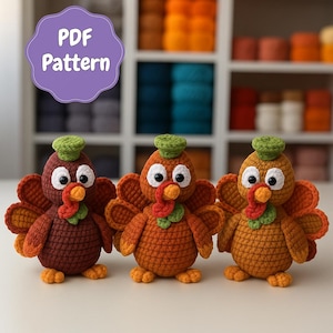 May include: Three handmade crochet turkey figurines in shades of brown, orange, and yellow. Each turkey has a green hat, white eyes, and a red wattle. The image includes a purple circle with the text "PDF Pattern".