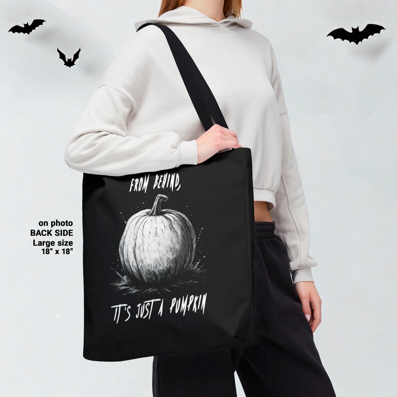 Spooky and funny tote bag featuring double-sided pumpkin artwork — perfect gift for friends.