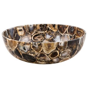May include: A decorative, oval-shaped bowl crafted from polished agate stone. The bowl features a mosaic pattern of brown, tan, and cream-colored stones, creating a unique and natural design. The bowl is ideal for decorative purposes.