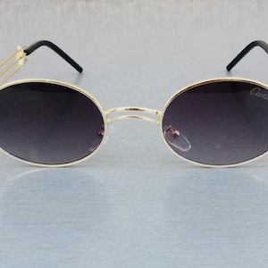 Cartier Gray & Gold Rim Women&#39;s Oval Sunglasses 