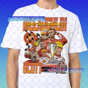 May include: White t-shirt with a graphic of Scott McLaughlin, a racing driver, with images of him, a race car, and a trophy. The design includes the text "Scott McLaughlin" in orange and yellow.