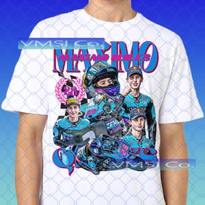 May include: White t-shirt featuring a graphic of a motorcycle racer with the text "MAXIMO QUILES" in pink and blue. The design includes images of the racer in action, a laurel wreath, and the number 23. The shirt also has the text "VMSI Co."