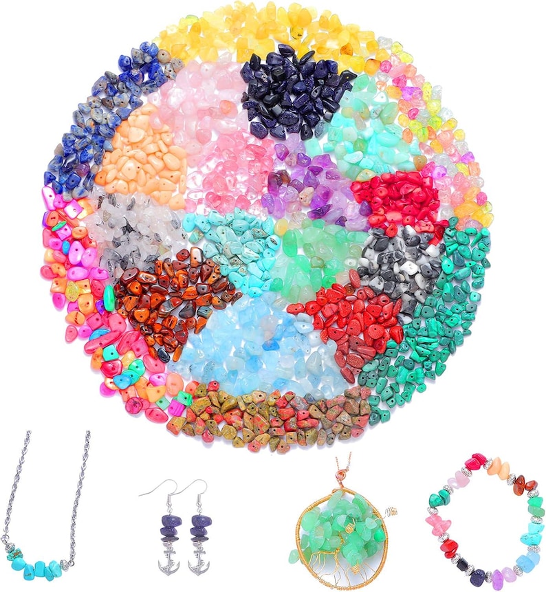May include: A vibrant assortment of colorful gemstone chips arranged in a circular pattern. The image also features a turquoise necklace, purple earrings with anchor charms, a green gemstone pendant, and a multi-colored bracelet.