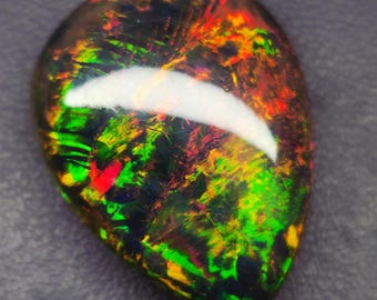 30.60 Ct Black Ethiopian Opal | Flashy Red-Green Fire | 26x20x12 mm | Teardrop Cabochon | Natural Collector Gem |