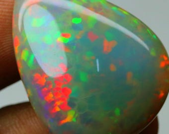 Naturlig etiopisk opal cabochon 23,85 ct oval eldopal | Flerfärgad flashig lös ädelsten för smycken och healing 29x23x8 mm