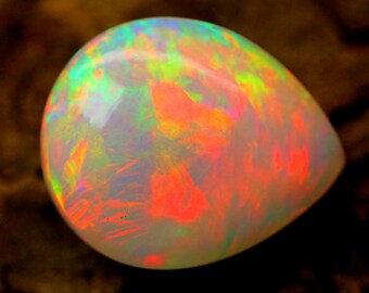 Cabujón de ópalo etíope de 34,10 ct / Intenso juego de colores neón / Ópalo de fuego en forma de pera / Piedra preciosa de colección / Ópalo suelto para anillo colgante