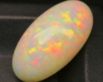 Opale etiope ovale grande da 23,80 ct / Pietra preziosa di opale di fuoco naturale / Gioco di colori brillante / Cabochon sfuso per gioielli personalizzati / Pietra portafortuna di ottobre