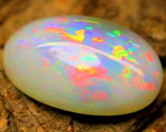 Cabujón de ópalo etíope enorme de 43,4 ct / Juego de colores neón arcoíris / Piedra preciosa de ópalo de fuego ovalada grande / Ópalo de colección para joyería llamativa