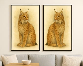 May include: Two framed art prints featuring a detailed illustration of a lynx. The lynx is depicted in a seated position with a light brown coat and dark spots. The artwork has a warm, neutral background and is framed in black.