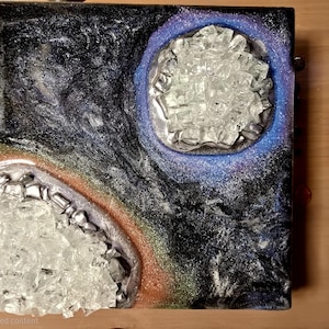 May include: A set of three ceramic mugs with a speckled, matte finish. The mugs are in shades of cream, light gray, and dark gray. Each mug has a simple, minimalist design, perfect for coffee or tea.