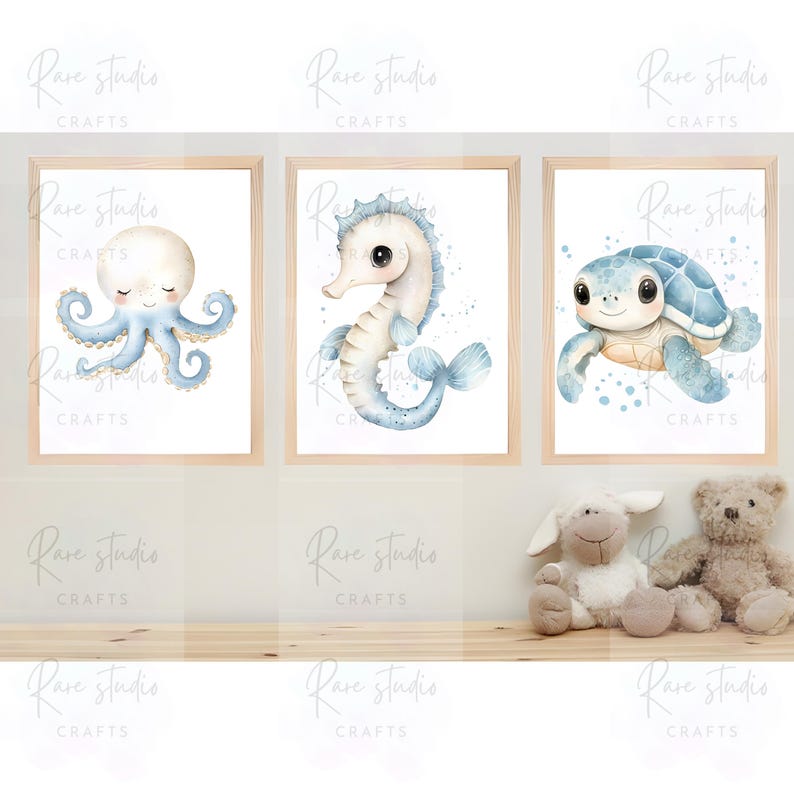 May include: Three framed watercolor prints featuring sea creatures. The prints depict an octopus, a seahorse, and a turtle, all in soft blue and beige tones. The frames are light wood. The overall theme is nautical and suitable for a nursery.