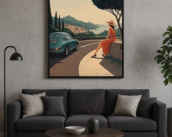 May include: A framed art print showing a coastal scene. A teal vintage car is on a winding road, with a person in a red dress and hat seated on a stone wall. The background features a town, mountains, and sea under a sunny sky.