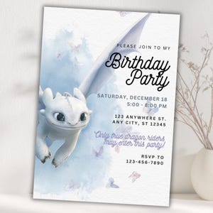 May include: A birthday party invitation featuring a white dragon illustration with a blue watercolor background and butterflies. The invitation includes the text "Birthday Party", date, time, address, and RSVP information.