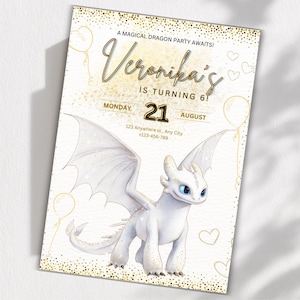 May include: A white invitation card with a cartoon dragon illustration. The card has gold accents and text that reads "Veronika's is turning 6!" with the date "21 August". Additional text includes "A Magical Dragon Party Awaits!"