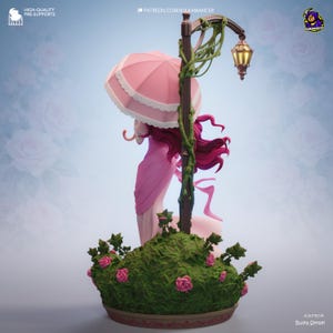 May include: A sculpture of a woman in a pink dress holding a pink parasol, standing near a lamppost with a lantern. The base is a bed of green foliage with pink roses. The sculpture is labeled "Bulka Sensei".
