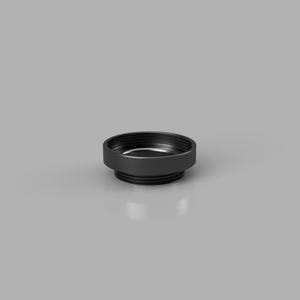 Pode incluir: Um componente adaptador circular preto fosco com um design escalonado, rosca visível na seção inferior e uma borda larga e lisa na seção superior, apresentado contra um fundo cinza neutro com um reflexo suave.