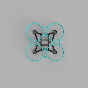 Op de afbeelding: Een zwart droneframe met vier cirkelvormige turquoise propellerbeschermers in een vierkante opstelling. De centrale structuur bestaat uit een stijf zwart chassis met bevestigingspunten voor motoren op elke hoek van het frame.