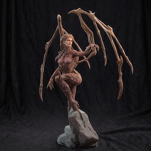 May include: A detailed sculpture of a humanoid figure with large, wing-like appendages. The figure is posed on a stone base, with intricate details in the skin and wings. The color palette is primarily earthy tones, with a dark background.