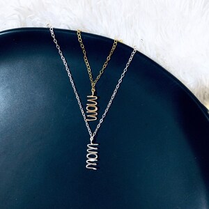 Collier or argent MOM