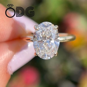 IGI Certified 2.1 Carat Oval Lab Grown Diamond Engagement Ring: 14k Gold Hidden Halo