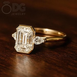 2 CT Emerald Cut Moissanite Engagement Ring: 14K Gold Bezel Set