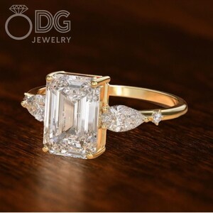 2 CT Emerald Cut Moissanite Engagement Ring: 10K Gold Bezel Set