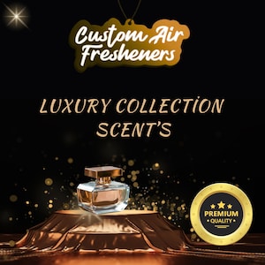 May include: A perfume bottle with a gold-coloured cap sits on a gold-coloured pedestal. The image features the text "Custom Air Fresheners" and "Luxury Collection Scent's". A gold-coloured seal with the words "Premium Quality" is also visible.