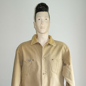 Vintage Men&#39;s canvas sand denim work coat Jacket from B90s XL with cord collar and multi pockets.