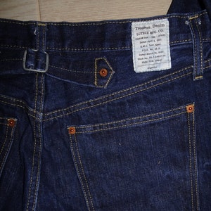 Lutece MFG co Vintage Style Redline Denim Cinch buckle back Jeans with red selvedge seam.