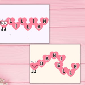 May include: Two cards with pink heart-shaped letters spelling out names. One card says "LILLIAN" with a cartoon butterfly. The other card says "DANIELLE" with a cartoon butterfly. The background is a light pink wooden surface.
