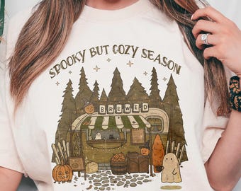 Spooky But Cozy Season Shirt, Cute Ghost Pumpkin Coffee Tee, Retro Autumn Cafe Fall Graphic TShirt, Vintage Creepy Cute Halloween Top