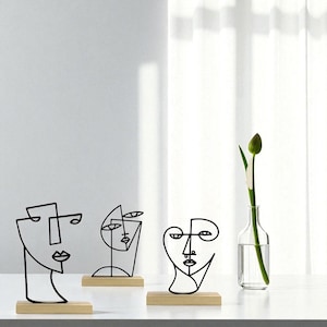 Abstract Woman Face Metal Sculpture: Modern Art Deco Statue