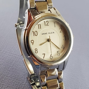 2000s Women&#39;s quartz Anne Klein silver tone with silver dial on stainless steel bracelet